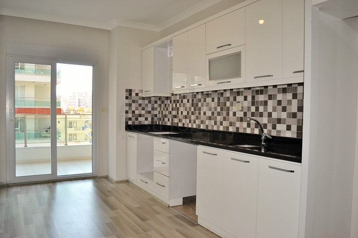 Трехкомнатная квартира в Махмутлар