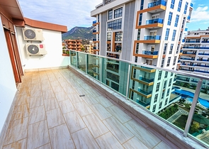 Пентхаус с планировкой 2+1 в Тосмуре