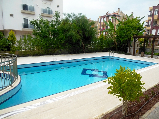 Просторные квартиры 3+1 и 4+1 в Унжалы Коньяалты Анталья