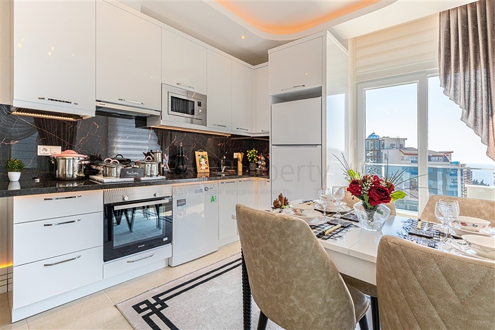 Квартиры в новом готовом комплексе в Махмутларе