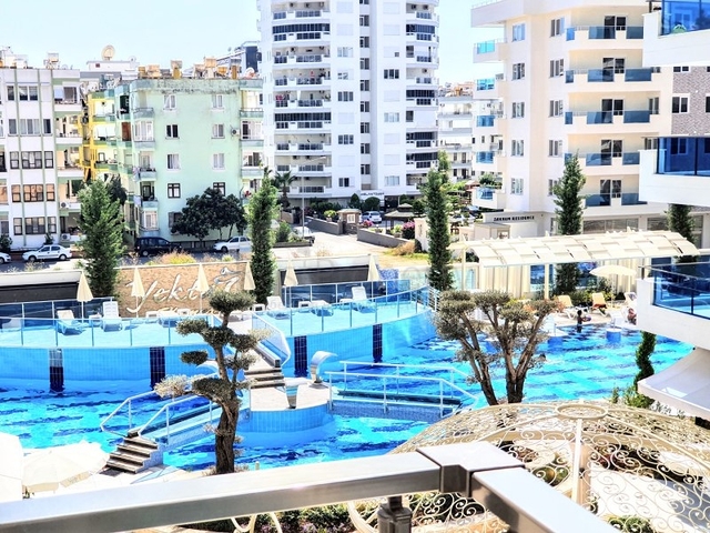 Квартиры планировки 2+1 в Махмутларе