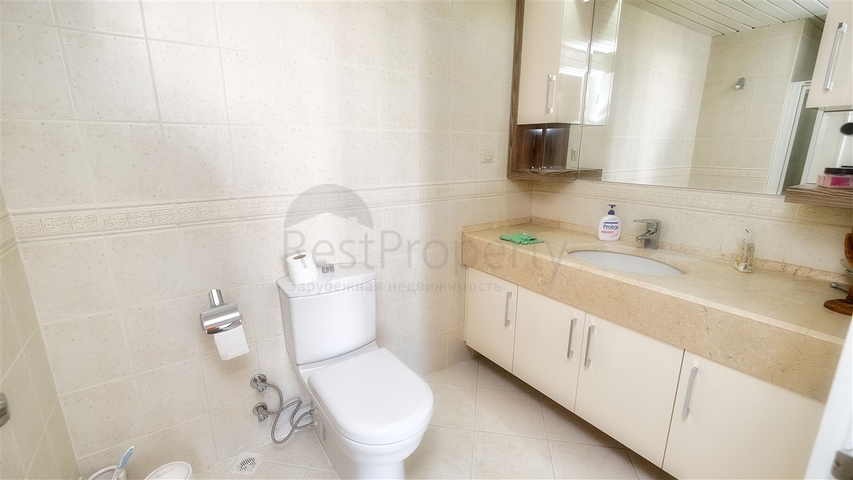 Просторная квартира 3+1 в Алтынкуме Анталья