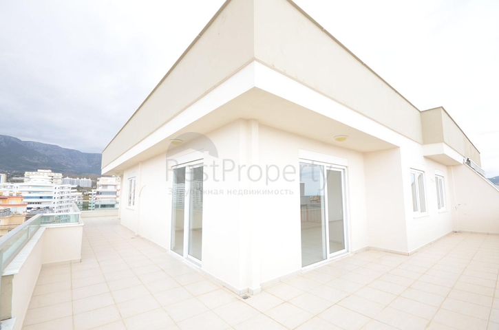 Пентхаус планировки 5+1 в Махмутларе