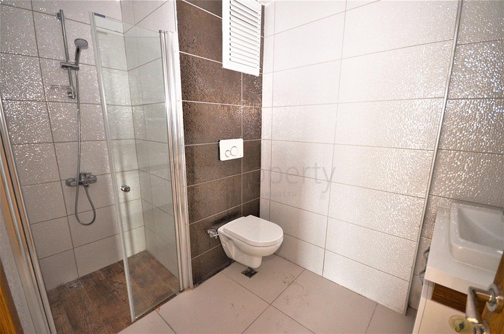 Пентхаус планировки 5+1 в Махмутларе