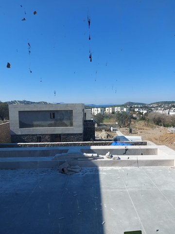 Строится комфортная вилла - проект в семейном районе Бодрума!