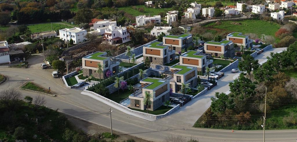 Строится комфортная вилла - проект в семейном районе Бодрума!