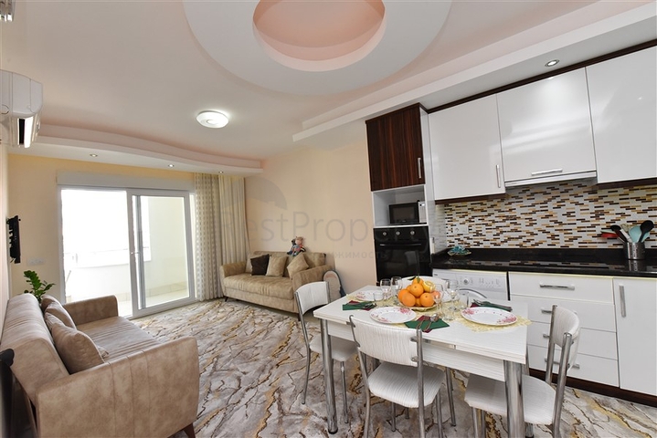 Меблированная квартира планировки 1+1 в районе Махмутлар