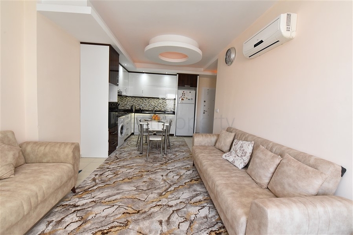 Меблированная квартира планировки 1+1 в районе Махмутлар