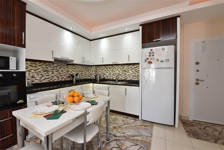 Меблированная квартира планировки 1+1 в районе Махмутлар