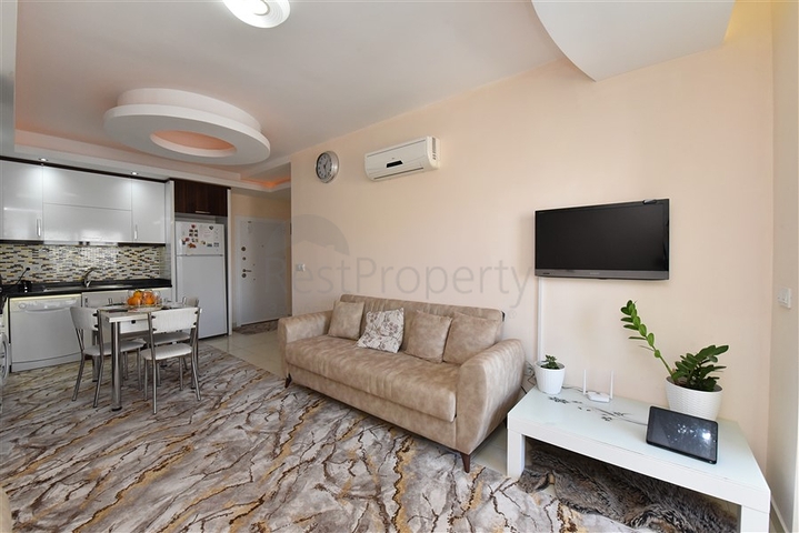 Меблированная квартира планировки 1+1 в районе Махмутлар