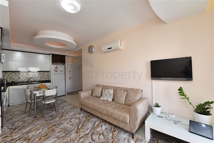 Меблированная квартира планировки 1+1 в районе Махмутлар