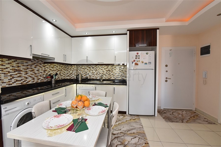 Меблированная квартира планировки 1+1 в районе Махмутлар