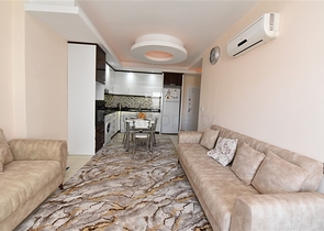 Меблированная квартира планировки 1+1 в районе Махмутлар