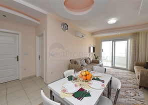 Меблированная квартира планировки 1+1 в районе Махмутлар