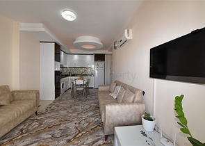 Меблированная квартира планировки 1+1 в районе Махмутлар