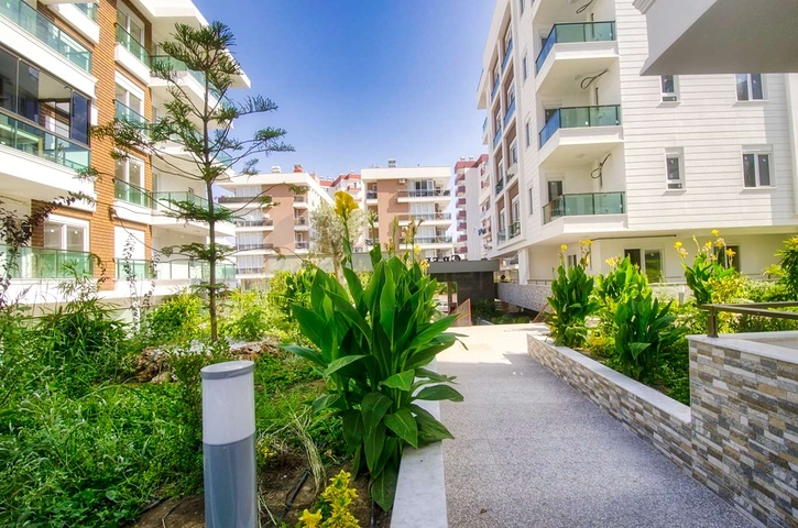 Двухкомнатная квартира в новом доме в Коньяалты Анталья