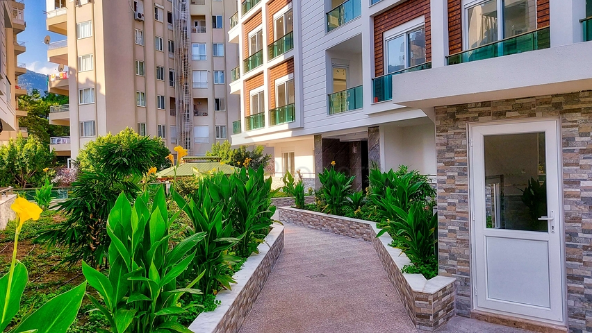 Двухкомнатная квартира в новом доме в Коньяалты Анталья