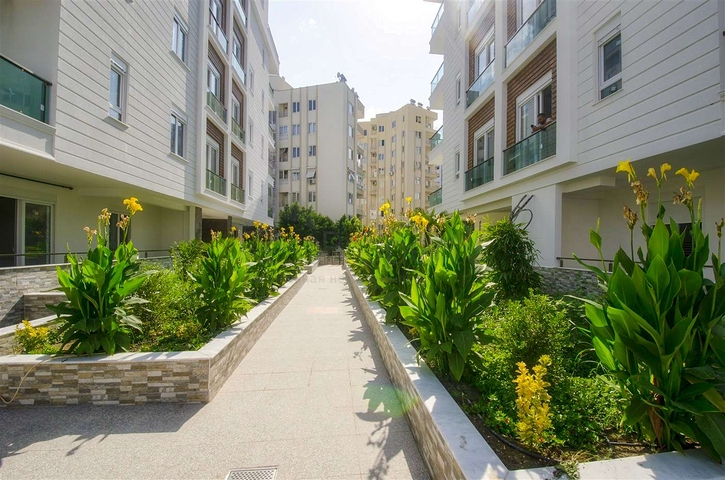 Двухкомнатная квартира в новом доме в Коньяалты Анталья