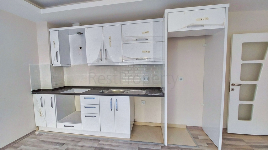 Двухкомнатная квартира в новом доме в Коньяалты Анталья