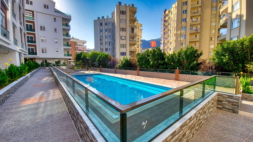 Двухкомнатная квартира в новом доме в Коньяалты Анталья