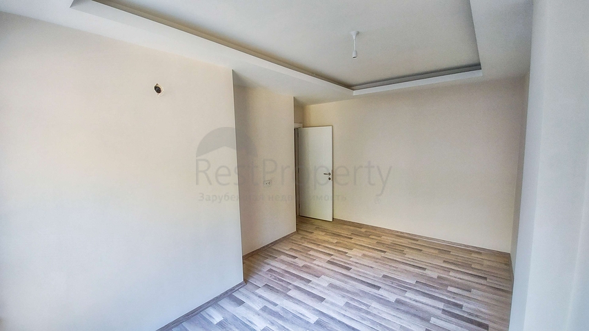 Двухкомнатная квартира в новом доме в Коньяалты Анталья