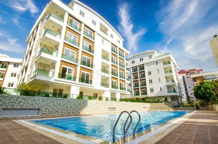 Двухкомнатная квартира в новом доме в Коньяалты Анталья