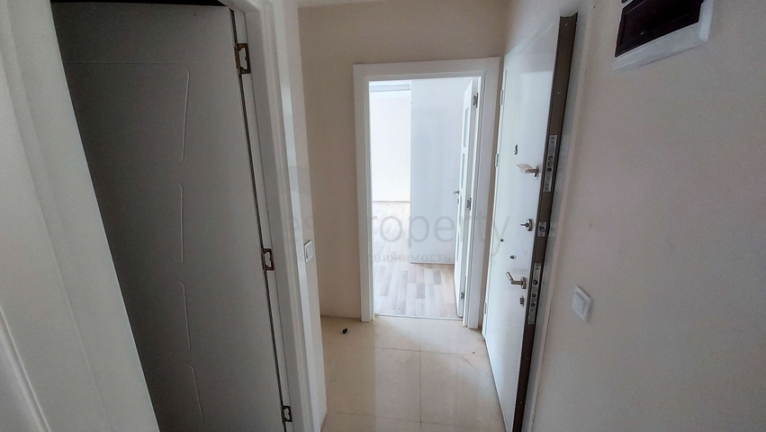 Двухкомнатная квартира в новом доме в Коньяалты Анталья