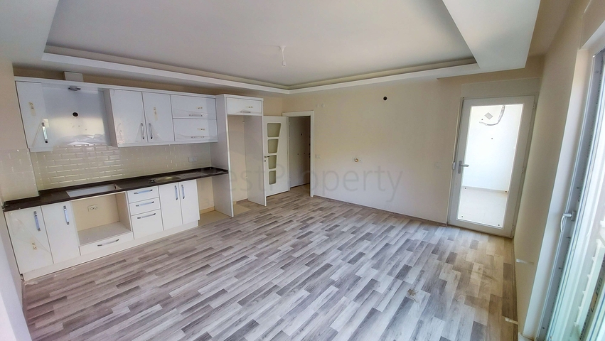 Двухкомнатная квартира в новом доме в Коньяалты Анталья