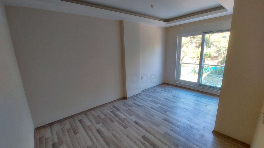 Двухкомнатная квартира в новом доме в Коньяалты Анталья