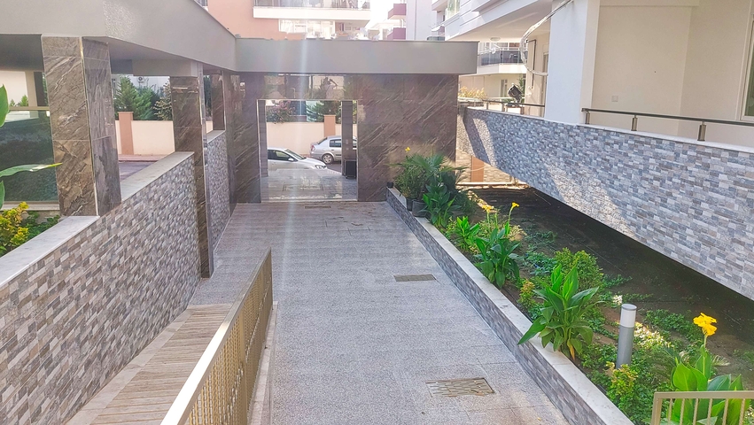 Двухкомнатная квартира в новом доме в Коньяалты Анталья