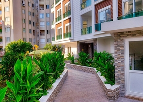 Двухкомнатная квартира в новом доме в Коньяалты Анталья