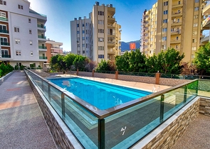 Двухкомнатная квартира в новом доме в Коньяалты Анталья