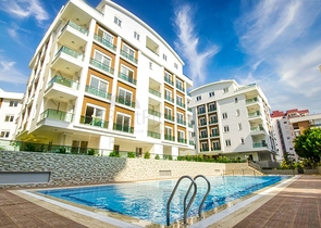 Двухкомнатная квартира в новом доме в Коньяалты Анталья