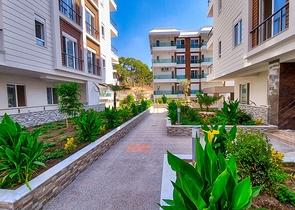 Двухкомнатная квартира в новом доме в Коньяалты Анталья