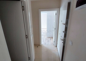 Двухкомнатная квартира в новом доме в Коньяалты Анталья