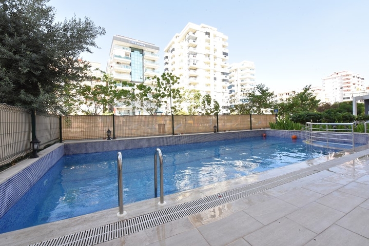 Меблированная квартира планировки 1+1 в районе Махмутлар