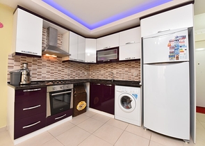 Меблированная квартира планировки 1+1 в районе Махмутлар