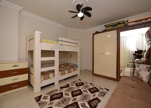 Меблированная квартира планировки 1+1 в районе Махмутлар