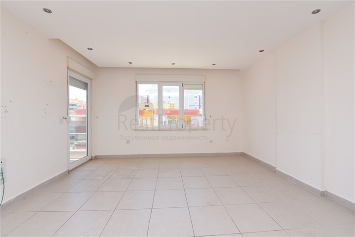 Трехкомнатная квартира в районе Махмутлар