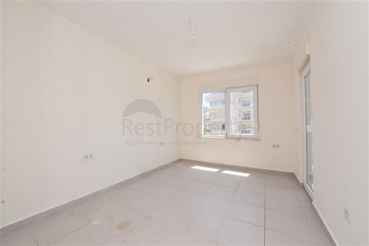 Трехкомнатная квартира в районе Махмутлар