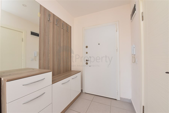 Трехкомнатная квартира в районе Махмутлар