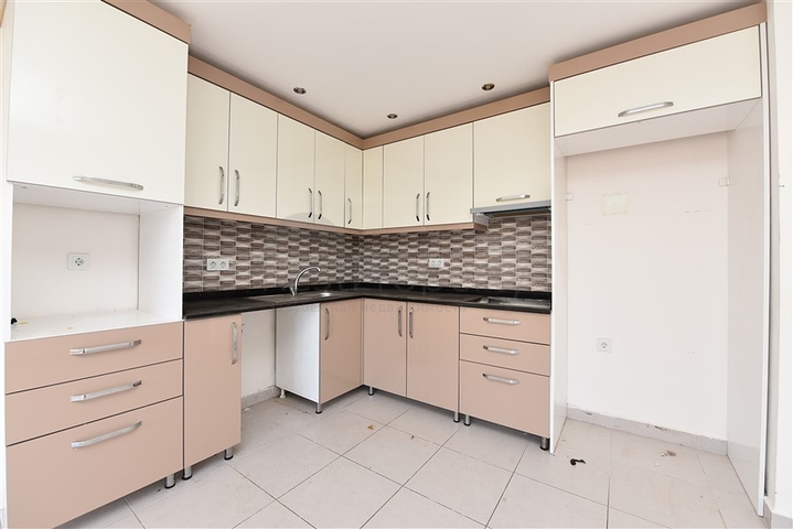 Трехкомнатная квартира в районе Махмутлар