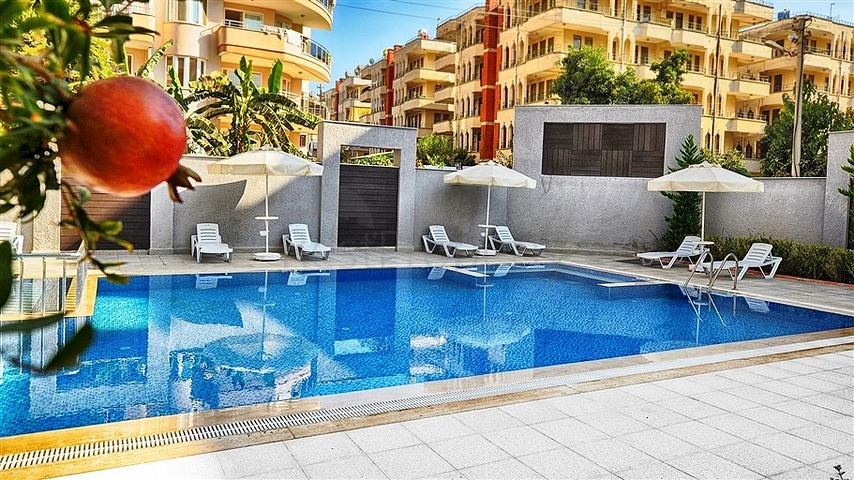 Трехкомнатная квартира в районе Махмутлар