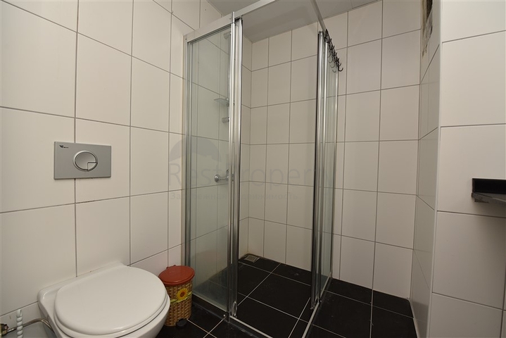 Трехкомнатная квартира в районе Махмутлар