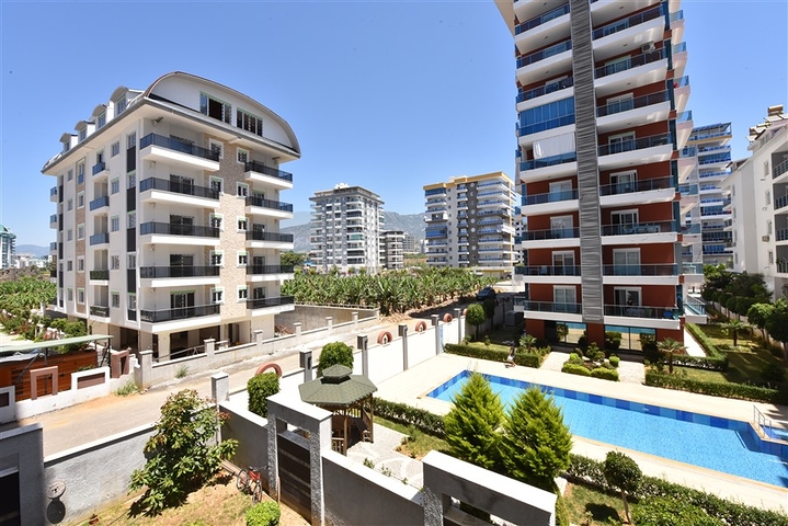 Трехкомнатная квартира в районе Махмутлар