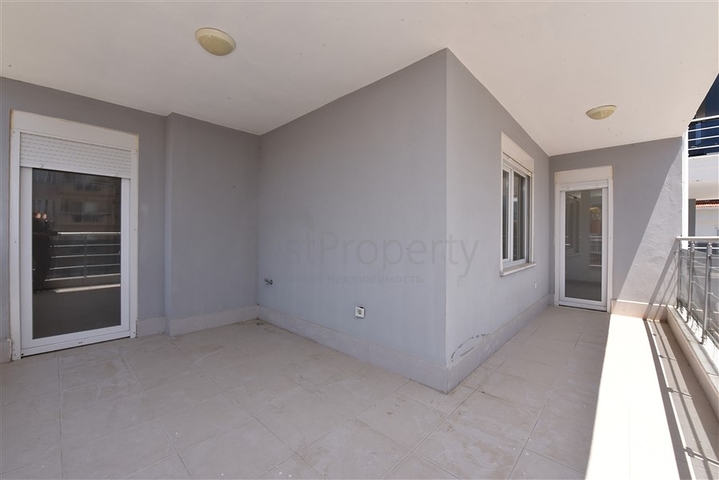 Трехкомнатная квартира в районе Махмутлар