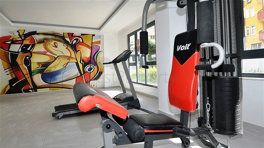 Трехкомнатная квартира в районе Махмутлар