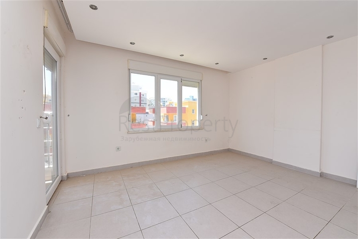 Трехкомнатная квартира в районе Махмутлар