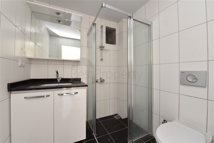 Трехкомнатная квартира в районе Махмутлар