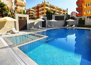 Трехкомнатная квартира в районе Махмутлар